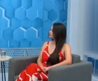 Aline como convidada do programa Aparecida Debate, na TV Aparecida